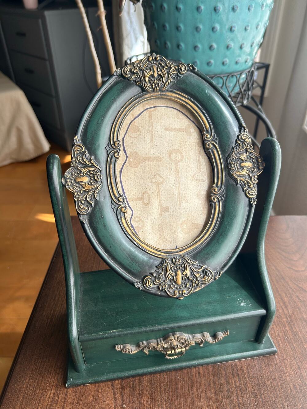 Vintage ornate dark green gold swivel photo frame with built-in base drawer